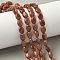 Synthetic Goldstone Beads Strands, Flat Oval, 8x6x3mm, Hole: 0.9mm, about 49~50pcs/strand, 15.16''~15.55''(38.5~39.5cm)