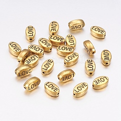 Perline in lega stile tibetano, ovale con la parola amore, San Valentino,  cadmio& piombo libero, oro antico, 10x6x4mm, Foro: 1 mm