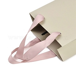 Geschenktüten aus Papier mit rosa Schleifengriffen&nbsp;ABAG-K004-03