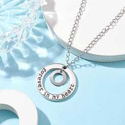 Collana con ciondolo rotondo in acciaio inossidabile 201 e lega con la scritta 