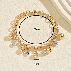 Braccialetti vintage da donna con ciondoli rotondi in ferro battuto e pavé di zirconi cubici trasparenti.&nbsp;WQ0011