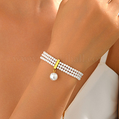 Pulseras multihilo con dije redondo de perla natural de agua dulce y cadena final de acero inoxidable.&nbsp;UK4868
