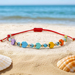 Braccialetti con maglie in vetro e cuore in turchese sintetico con malocchio&nbsp;IQ8070