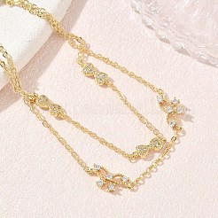 Bracciale a un filo in ottone con maglie a fiocco e zirconi cubici trasparenti micro pavé&nbsp;KK-CBA6980-19G