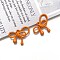 Spray Painted Alloy Pendants, Bowknot, Orange, 19x21mm