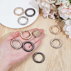 9 anneaux de porte à ressort en alliage de 3 couleurs.&nbsp;FIND-NB0006-25B