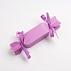 キャンディー形状の厚紙箱  結婚式の誕生日パーティーのギフトボックス  リボン飾り付き  暗い蘭  18.5x4x4cm CON-G008-A03-1