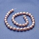 Fili di perle di perle d'acqua dolce coltivate naturali PEAR-P060-28A-01-2
